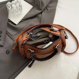 Women Bag multi-pocket design with tassel and metal accents, GREEN