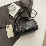 Women Bag multi-pocket design with tassel and metal accents, supports multiple carrying methods, combining practicality and style..light brown